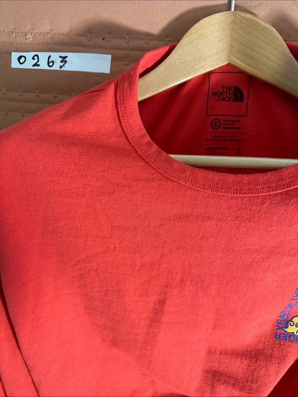 The North Face Men's Long Sleeve Orange Graphic Tee with Sleeve Logo